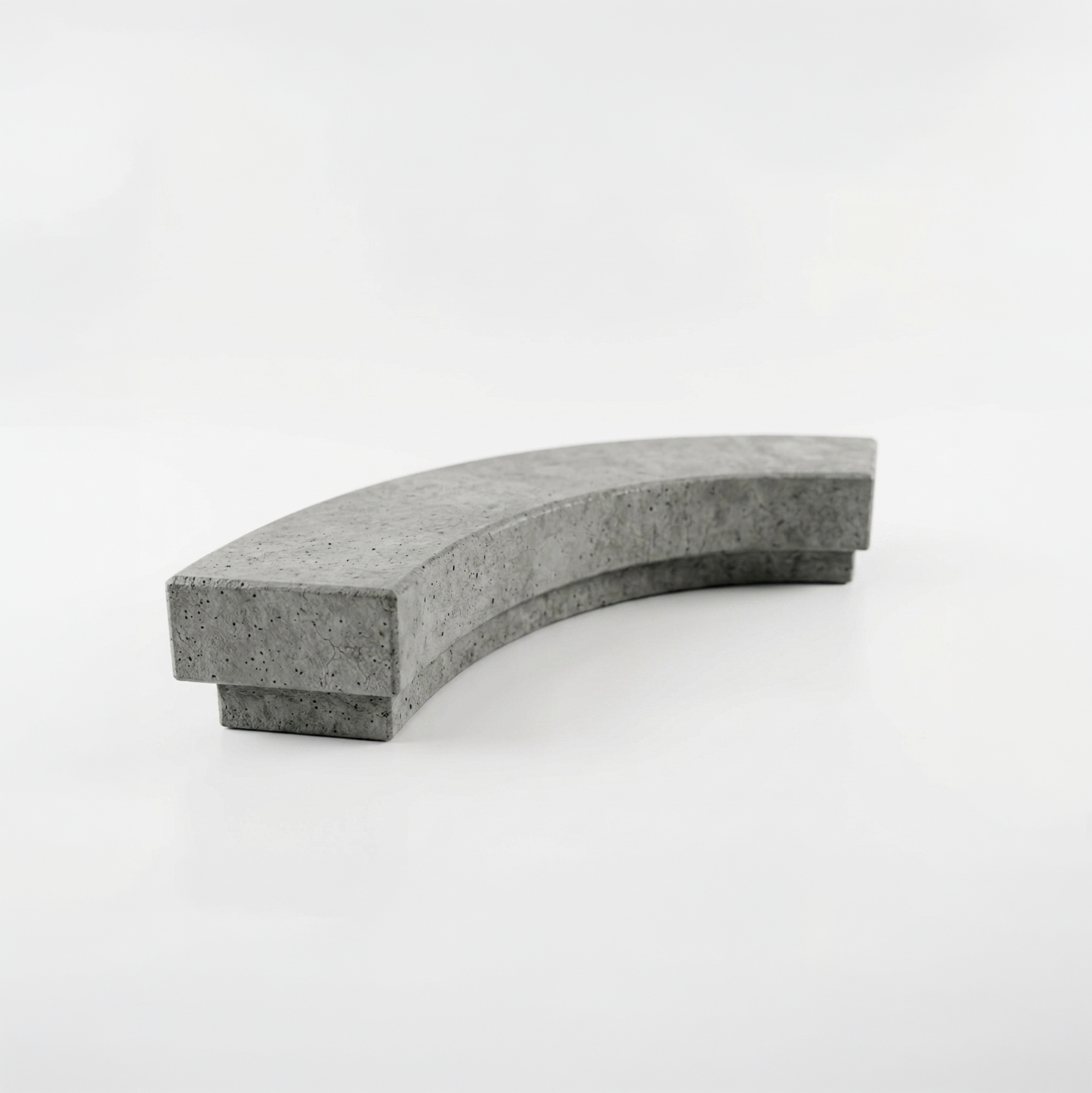 Concrete curve ledge fingerboard obstacle